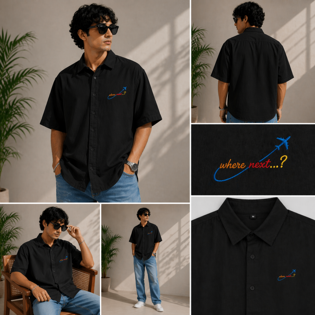 Man wearing black Salt and Soil oversized holiday shirt with blue airplane embroidery.